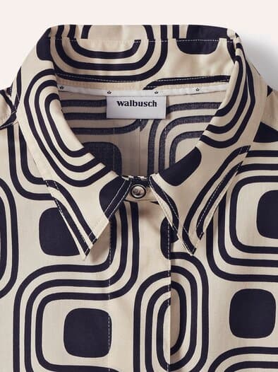 Baumwollbluse mit langer Manschette Grafik Creme