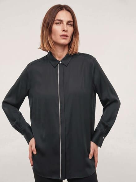 Bluse mit Glitzerkante Schwarz